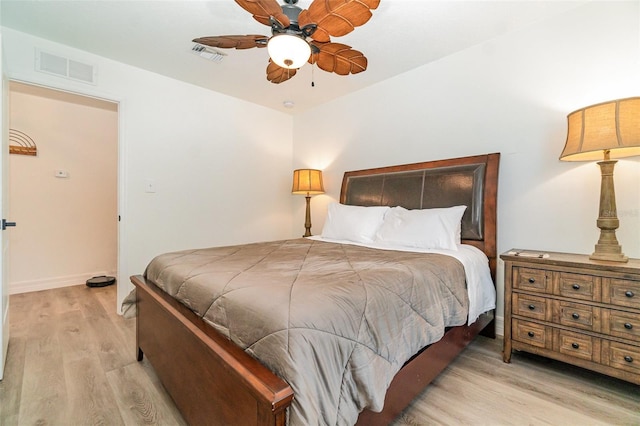 bedroom featuring ceiling fan and light hardwood / wood-style flooring