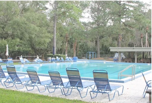 view of pool with a patio area