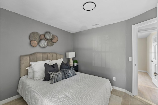 bedroom featuring light wood-type flooring