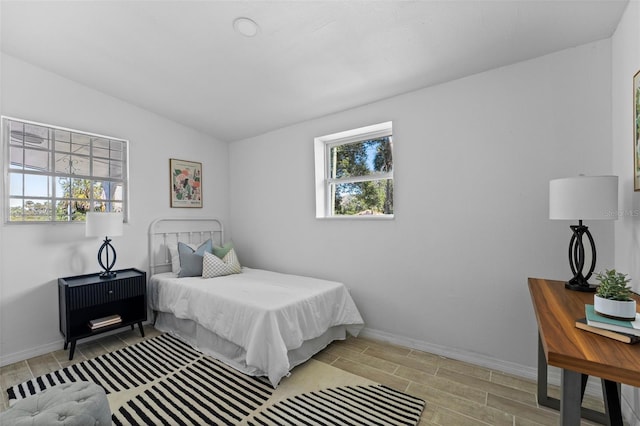 bedroom with lofted ceiling