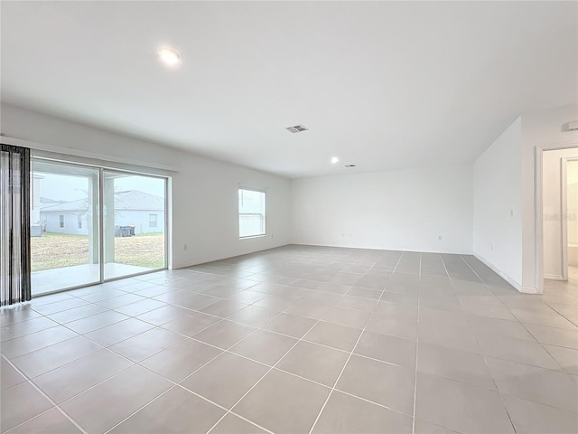 view of tiled spare room