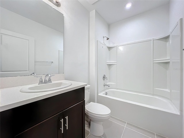 full bathroom with shower / bath combination, toilet, tile patterned floors, and vanity