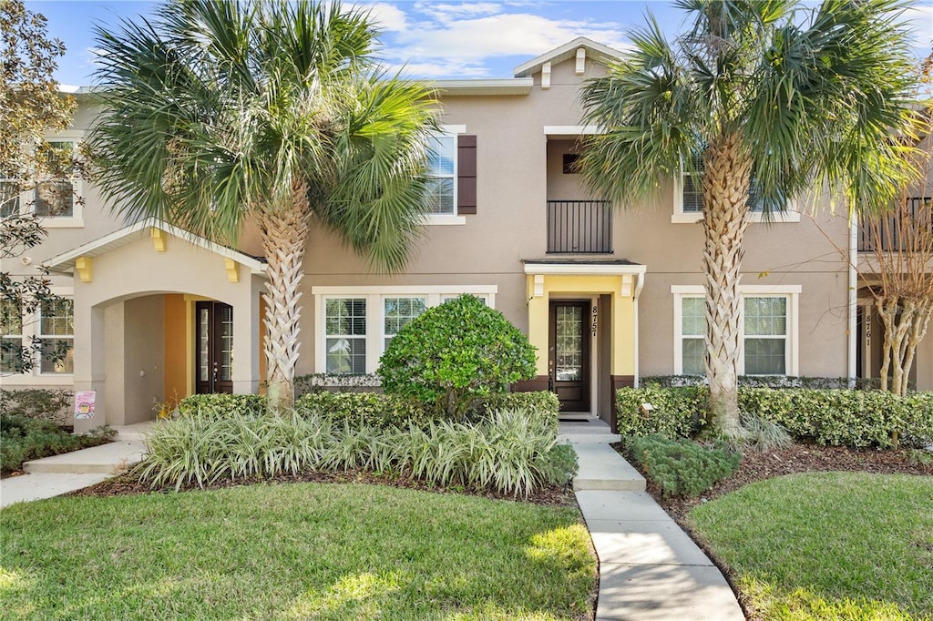 view of front of house with a front lawn