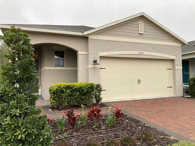 view of front of property with a garage