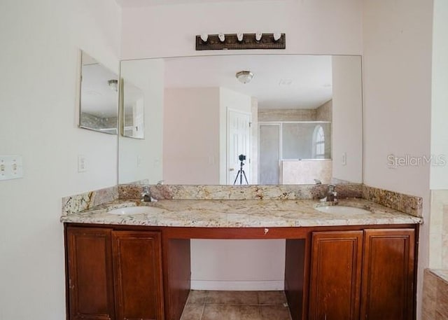 1010 Embrun Ct, Kissimmee, FL 34759 - bathroom featuring a sink, a stall shower, and double vanity