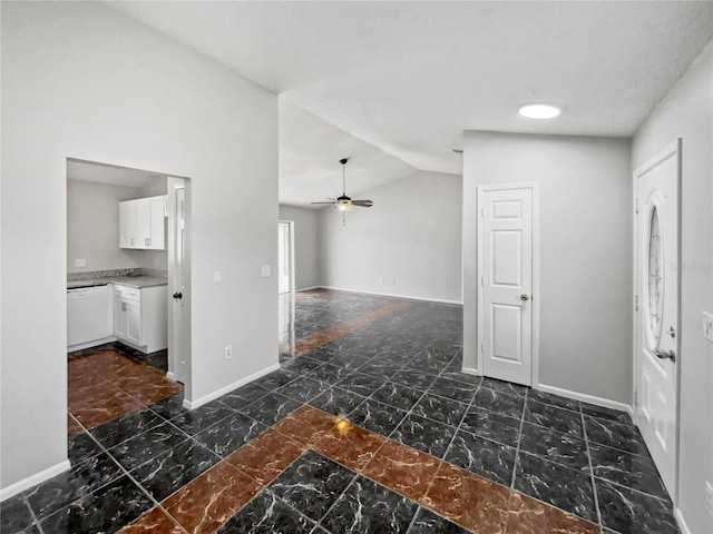 entrance foyer with ceiling fan and lofted ceiling