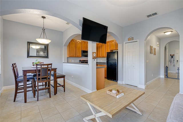 view of tiled dining area