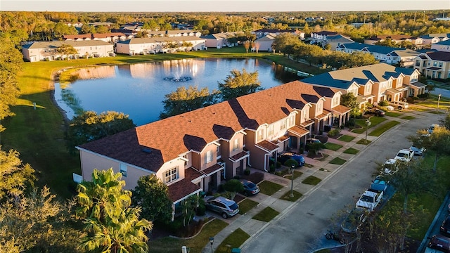 bird's eye view with a water view