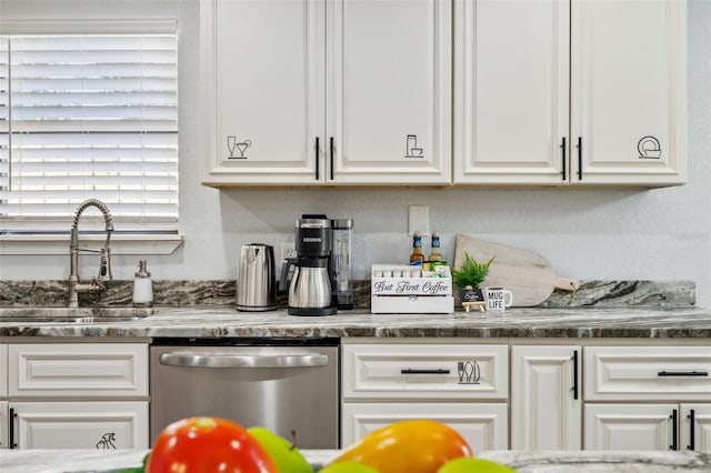 kitchen with sink, stainless steel dishwasher, and white cabinets