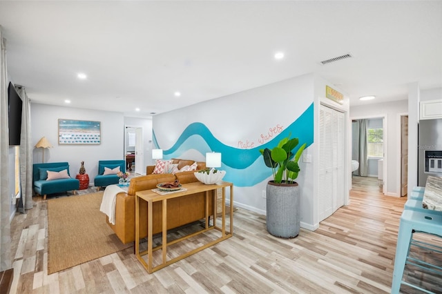 living room with light wood-type flooring