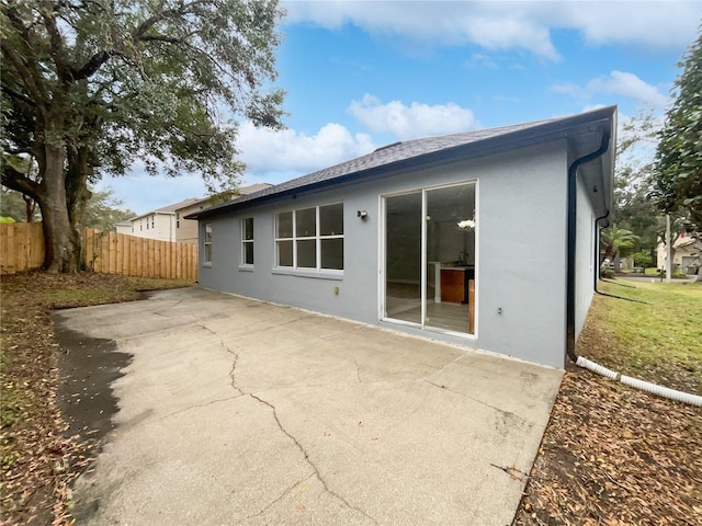 rear view of property with a patio