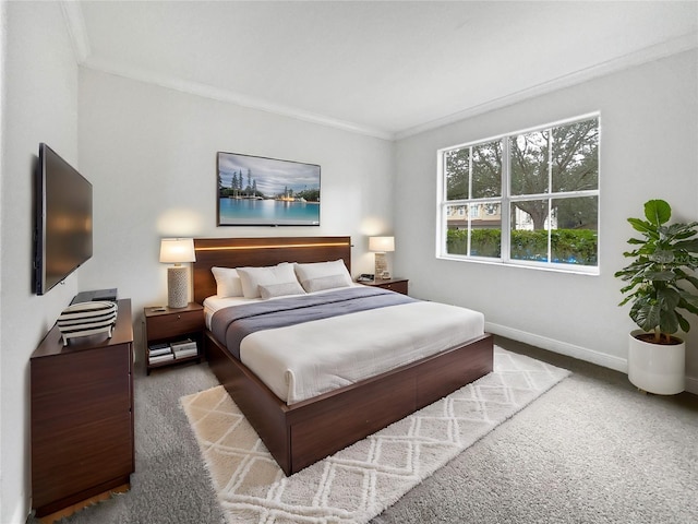 carpeted bedroom featuring ornamental molding