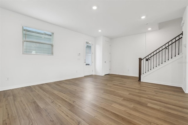 interior space with hardwood / wood-style flooring