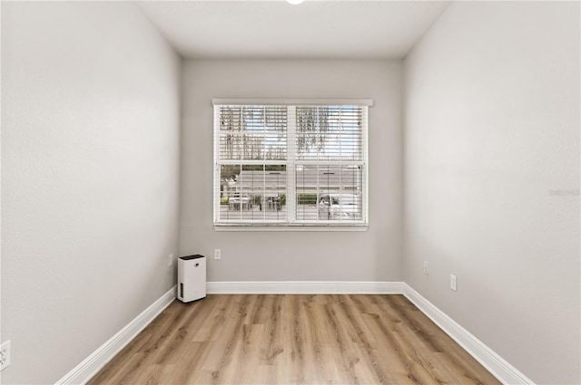 unfurnished room featuring light wood-type flooring