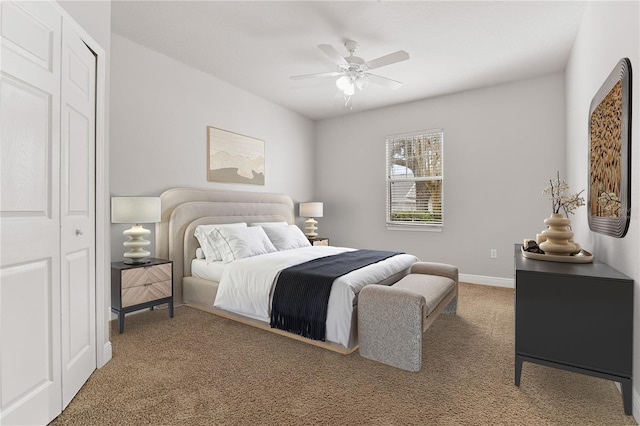 bedroom with ceiling fan and carpet flooring