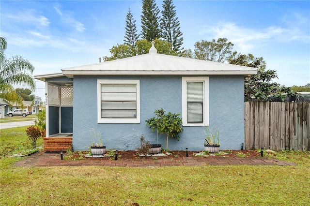 view of property exterior featuring a yard