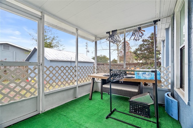 sunroom with plenty of natural light