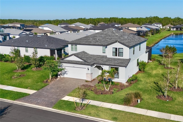 bird's eye view with a water view