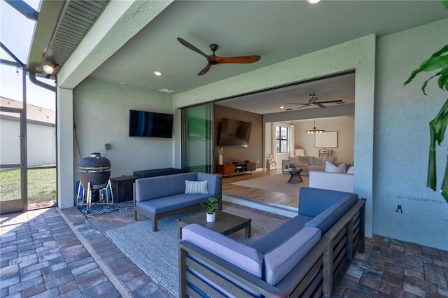 view of patio / terrace featuring ceiling fan and an outdoor hangout area