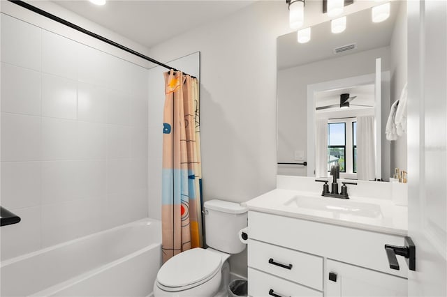 full bathroom with toilet, vanity, and shower / tub combo with curtain