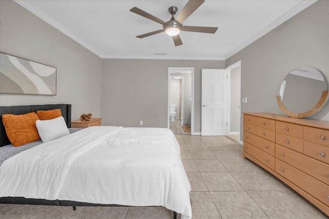 bedroom featuring crown molding, ensuite bathroom, ceiling fan, and light tile patterned floors