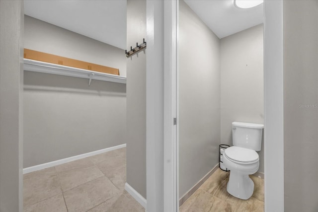 bathroom featuring toilet