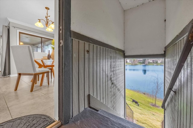 doorway to property featuring a water view