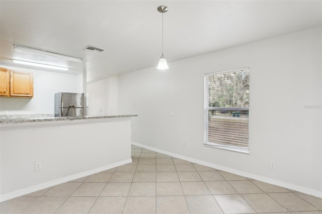 view of tiled empty room