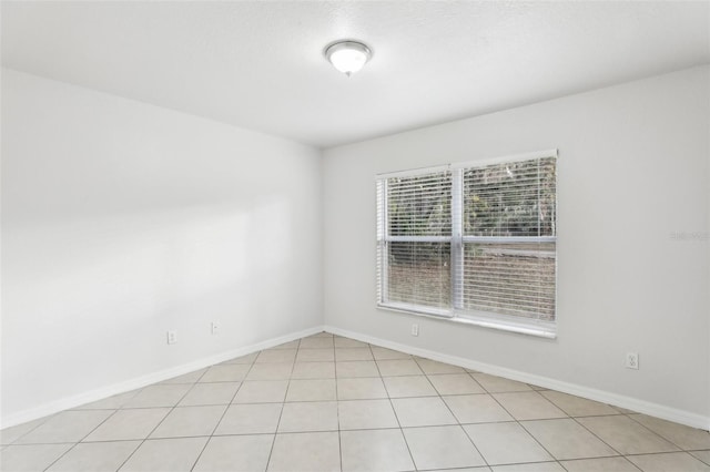 view of tiled empty room