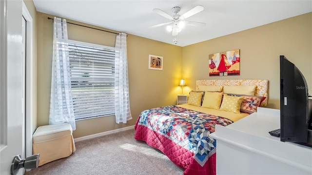 bedroom featuring ceiling fan and carpet flooring