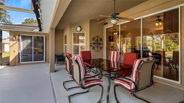 view of patio / terrace featuring ceiling fan