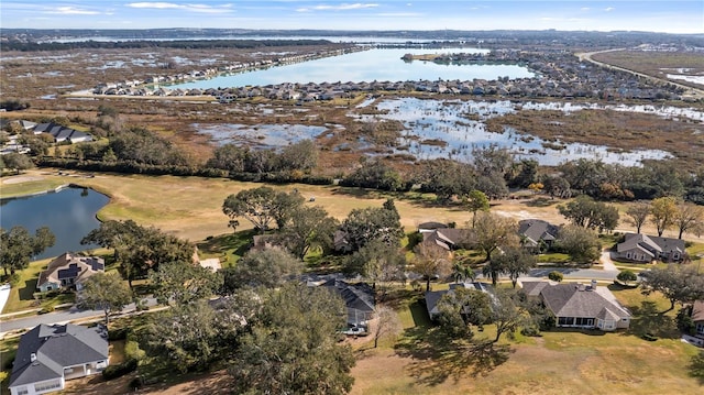 drone / aerial view with a water view