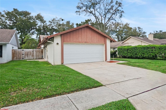 garage with a yard