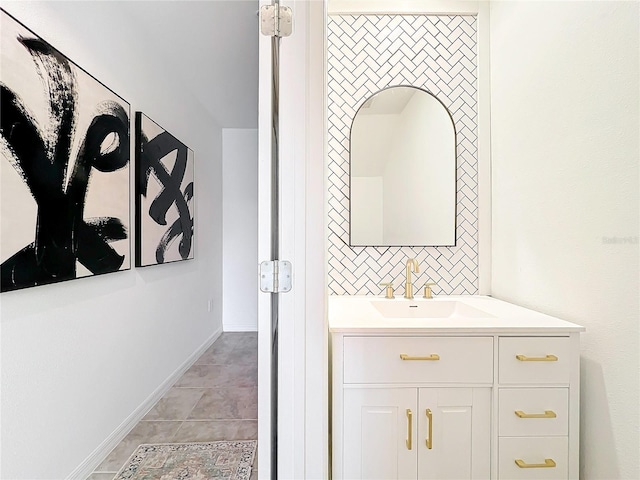 bathroom with vanity and tile patterned flooring