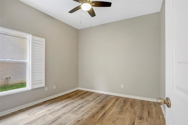 unfurnished room featuring ceiling fan and light hardwood / wood-style flooring