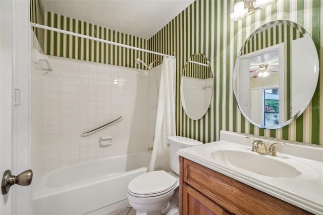 full bath featuring toilet, wallpapered walls, shower / bath combo, and vanity