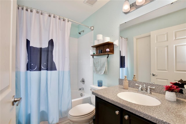 full bathroom with vanity, shower / bath combo, and toilet