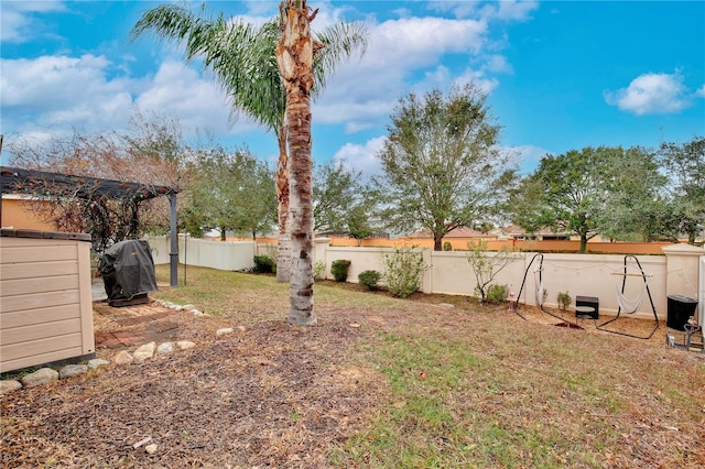 view of yard with a pergola