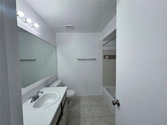 full bathroom with shower / tub combination, toilet, vanity, and tile patterned flooring