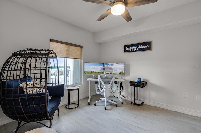 home office with ceiling fan, baseboards, and wood finished floors