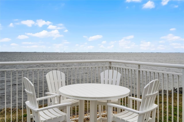 balcony featuring a water view