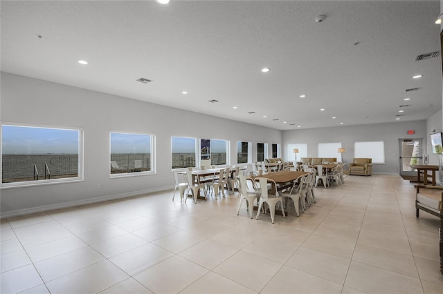 dining space featuring recessed lighting, visible vents, and baseboards