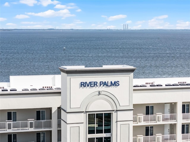 view of property with a water view