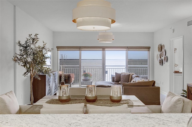 dining space with visible vents and baseboards