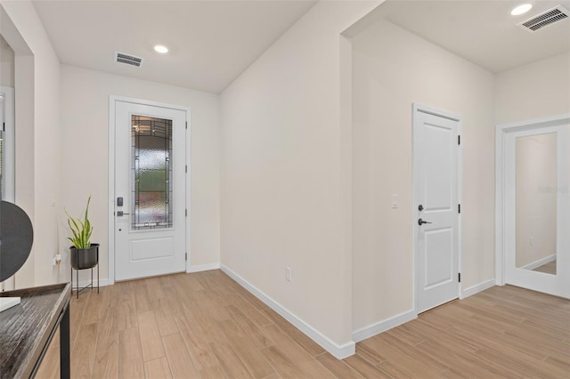 foyer entrance featuring light hardwood / wood-style floors