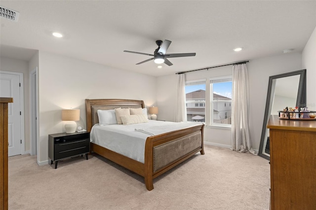 carpeted bedroom featuring ceiling fan