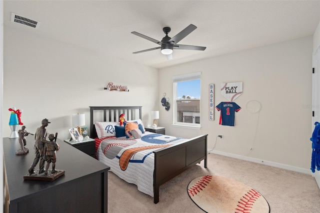 carpeted bedroom featuring ceiling fan