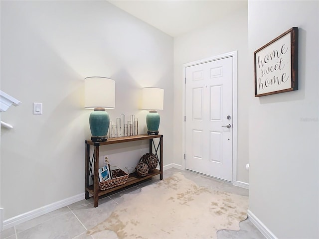 foyer with light tile patterned floors