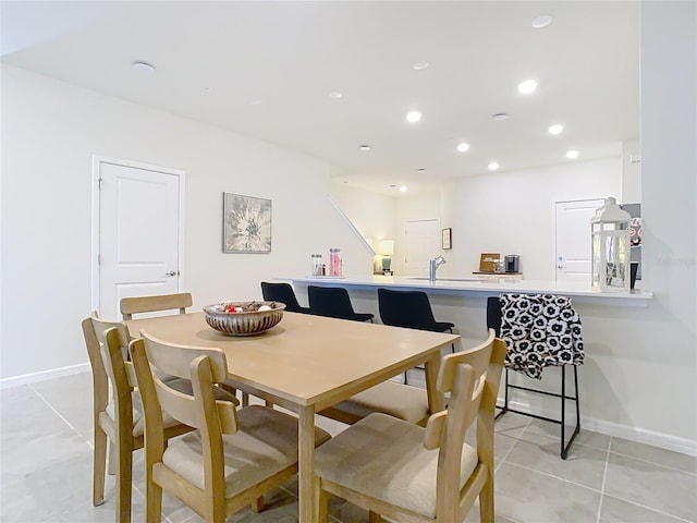 dining room with light tile patterned floors