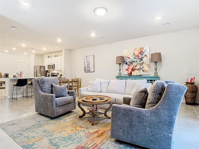 living room with light tile patterned floors